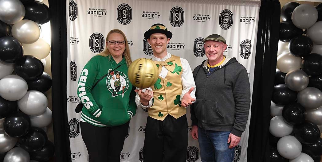 Fans with Lucky the Celtics Mascot